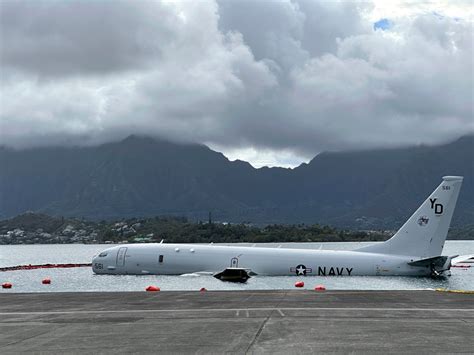US Navy releases underwater footage of plane that overshot a runway floating above Hawaii reef